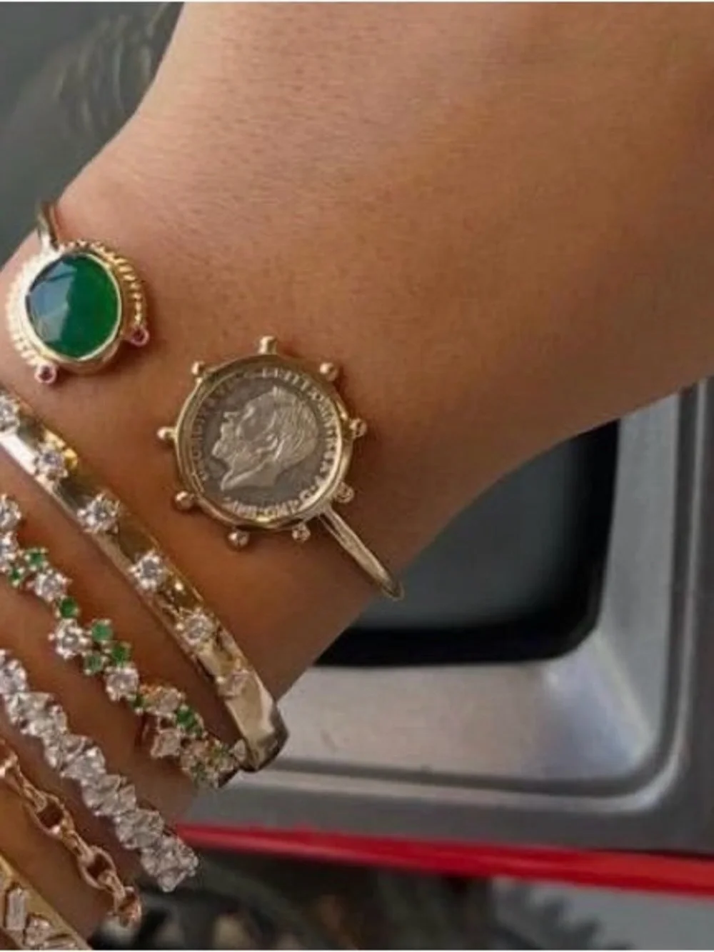 21 kt custom hand made bangle with accent stone